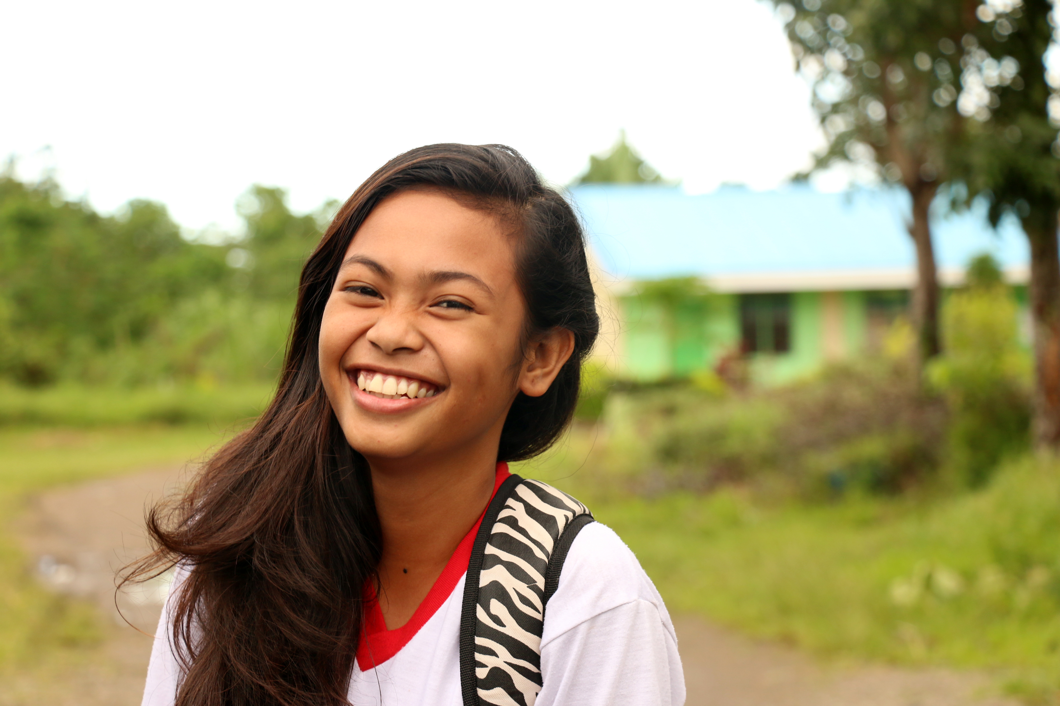 lachend meisje GirlPower Filipijnen werk