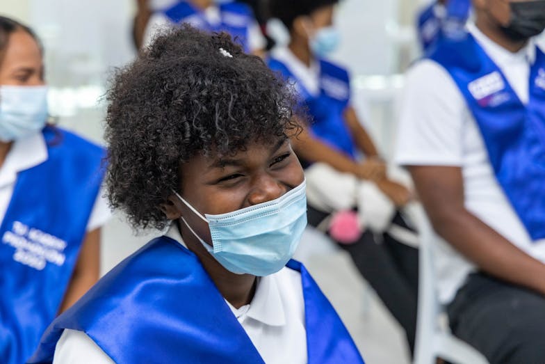 Smiling student with mask on
