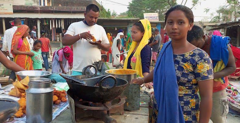 Sakuntala bij haar marktkraam