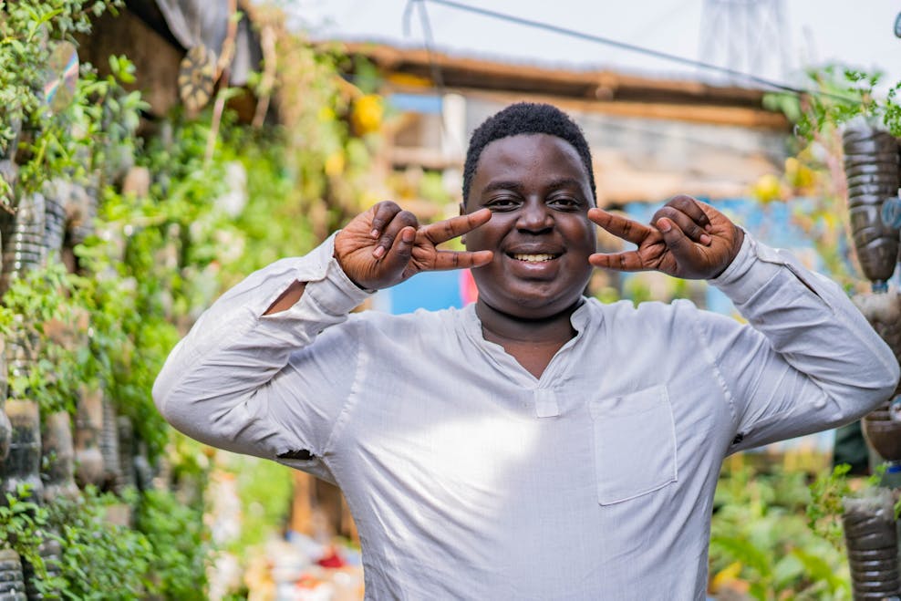Okumu werkt aan veiligere wijken in Kampala | © Plan International